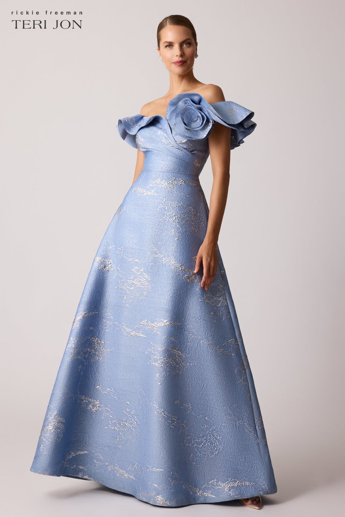 Off Shoulder Jacquard Ruffle Gown With Flower Applique Off Shoulder Jacquard Ruffle Gown With Flower Applique